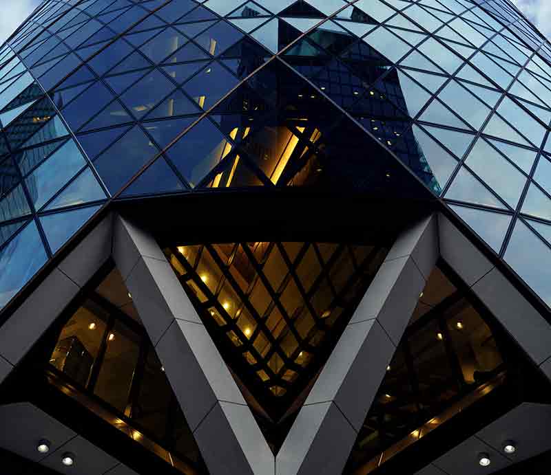 30 St Mary Axe Triangular glass exterior and lower structure.