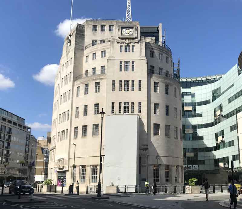 Broadcasting House The circular frontage of the building with clock tower.