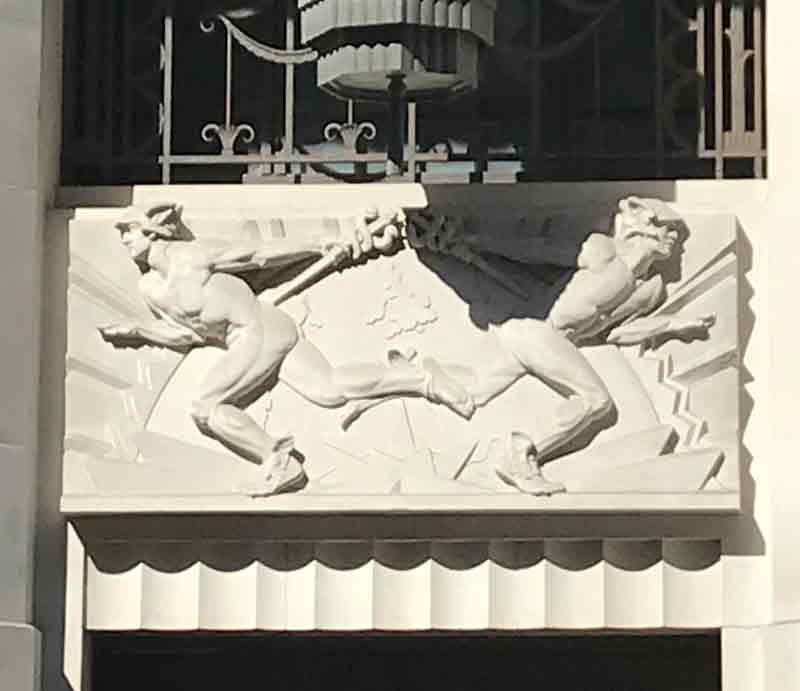 Fresco Art Deco styled carving of Mercury over entrance.