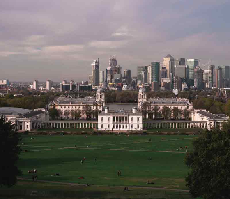 View of the Royal Observatory and Canary Wharf skyscrapers in background.