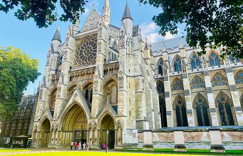Westminster Abbey Exterior facade of the Gothic masterpiece, adorned with intricate carvings and towering spires.