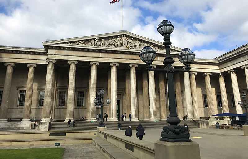 Exterior of the frontage showing the columns and ornate light.