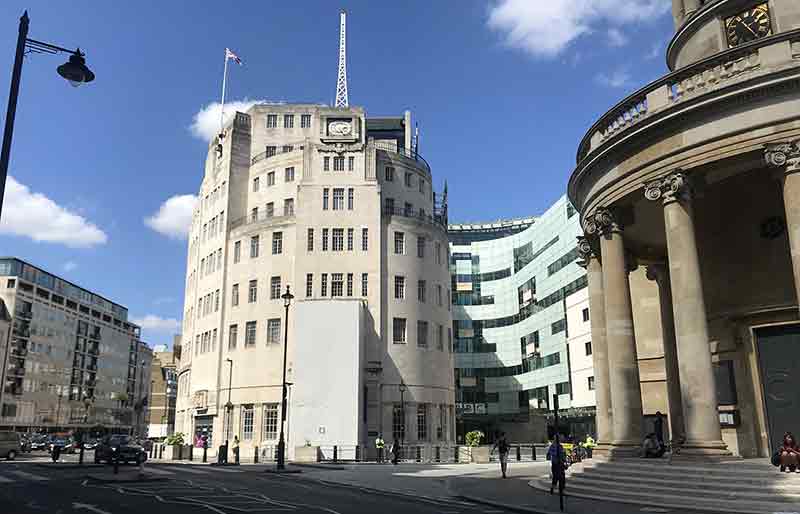 Broadcasting House Art Deco front facade of curved glass and Portland stone.