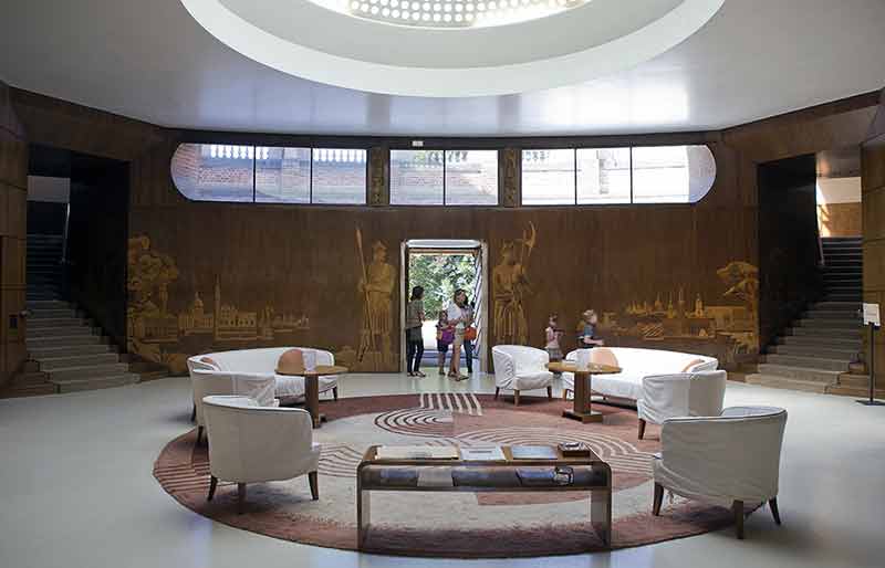 Eltham Palace The luxurious foyer with Art Deco design carpet, furniture and parquetry wooden panels.