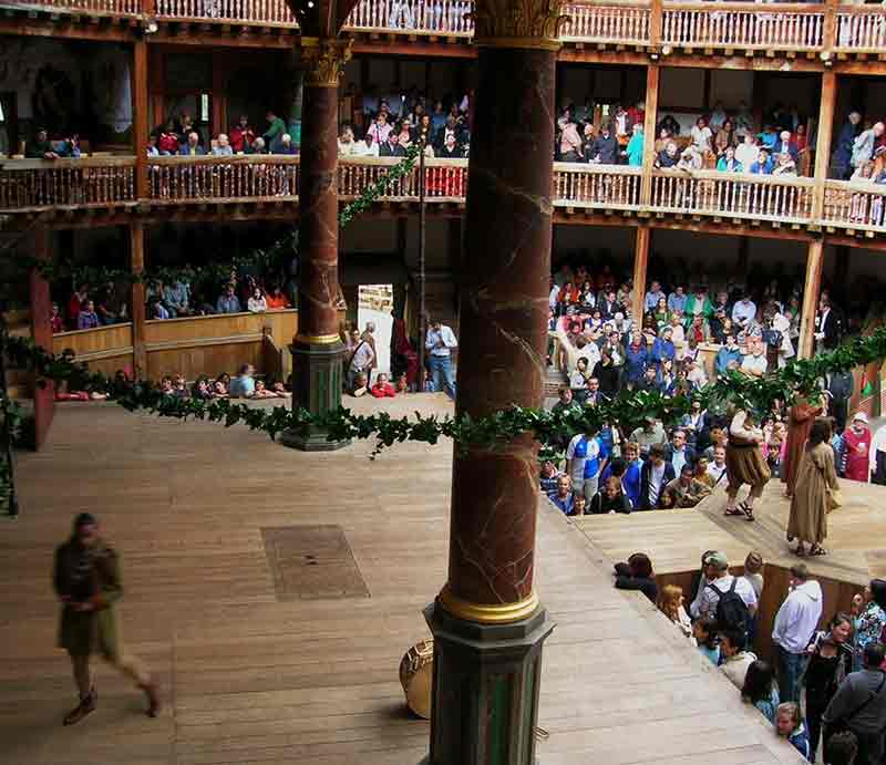Shakespeare's Globe Theatre Stage with actors and audience in galleries.