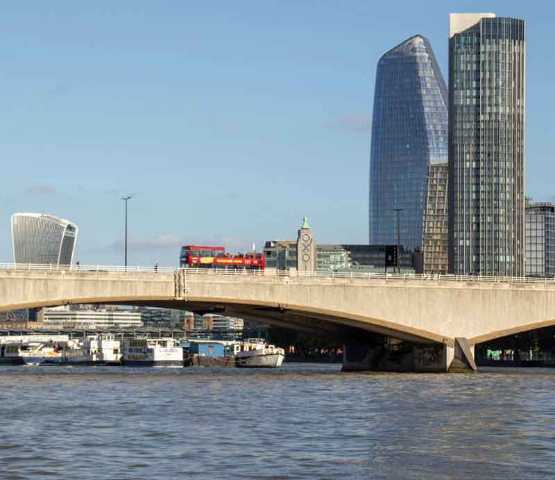 Waterloo Bridge The conctete profile with skyscrapers and the OXO Tower in the distance.